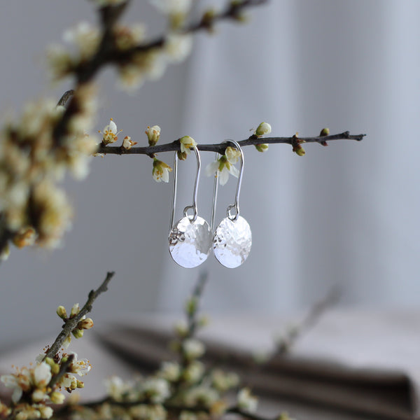 Silver hammered disc earrings