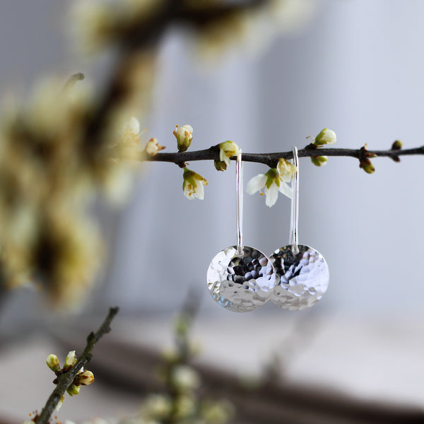 Silver hammered disc earrings