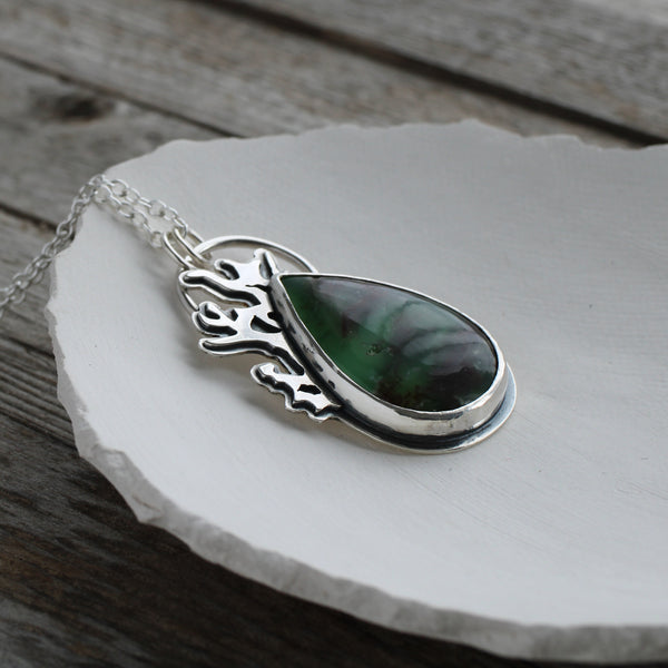 Green chalcedony silver pendant with lichen oxidised element